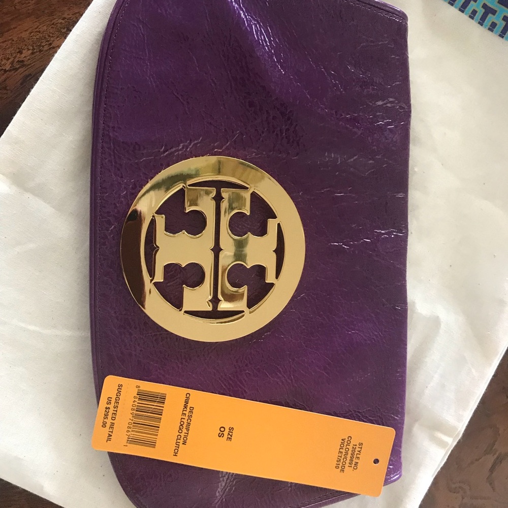 Tory Burch clutch never used